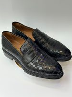 Mocassin penny loafer en cuir noir texturé effet croco
