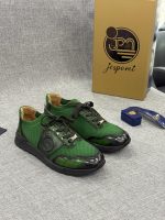 Sneaker en maille verte avec détails en cuir
