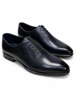 Richelieu noir lisse Jespomi pour homme avec finition brillante, silhouette épurée et lacets fins.