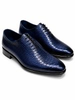 Richelieu homme bleu marine effet croco Jespomi en cuir embossé avec finition brillante et laçage fermé.