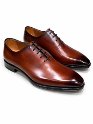 Richelieu homme marron cognac en cuir lisse avec finition patinée brillante et laçage fermé, modèle élégant Jespomi.
