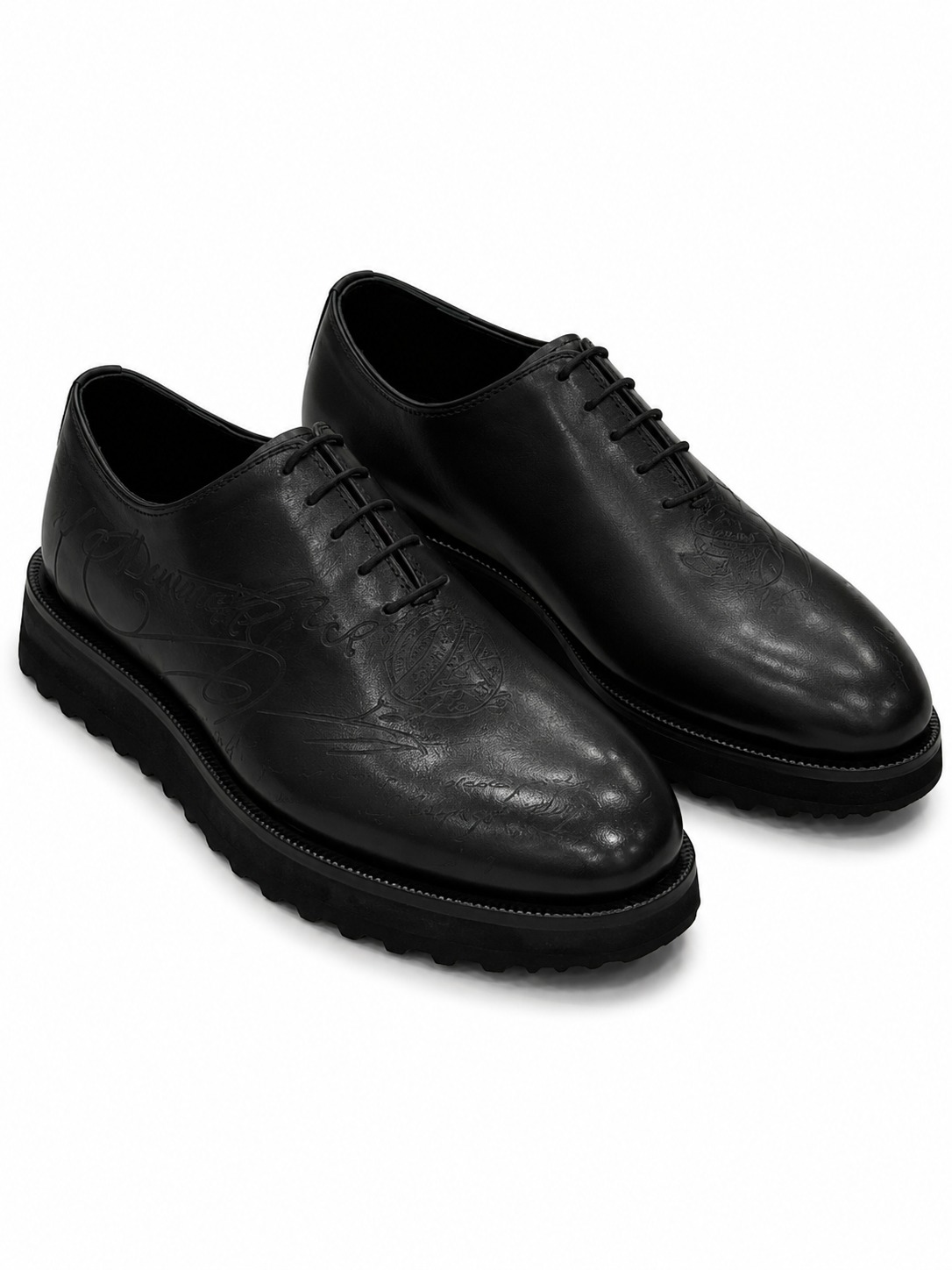 Chaussures richelieu en cuir noir gravé à semelle crantée Jespomi