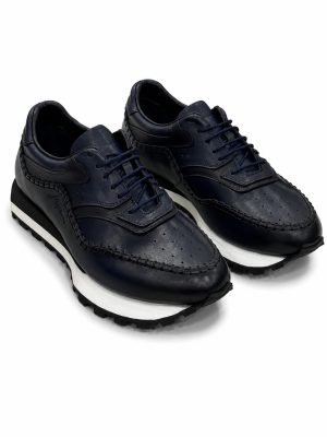 Sneakers en cuir bleu marine pour homme avec coutures apparentes et semelle crantée blanche Jespomi.