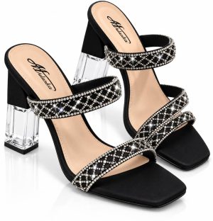 Mules noires à talon haut transparent et brides ornées de strass